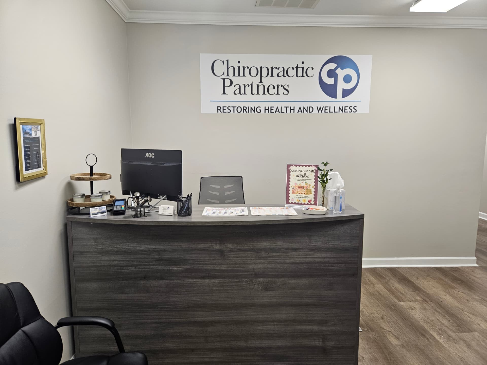 The Chiropractic Partners Cary front desk and reception area